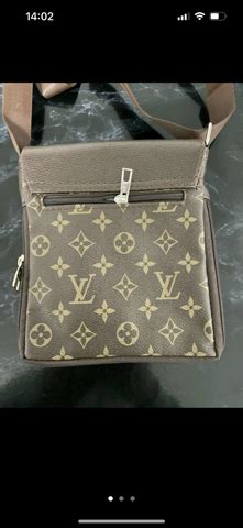 louis vuitton umhängetasche herren fake|false louis vuitton labels.